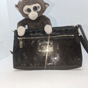 Michael Kors black patent leather wristlet/mini bag